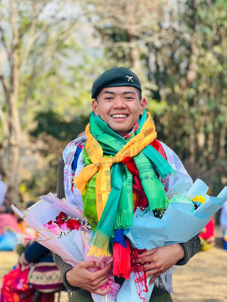 Successful graduate celebrating recruitment achievement